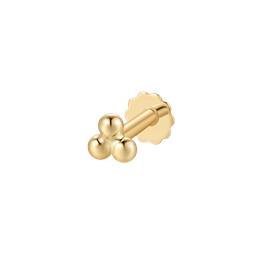 Guld labret piercing